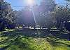 There is an amazing green space behind this cottage. Beyond this is Tybee's Jaycee Park with walking path, playground, and disc golf course.  