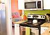 Updated, bright and cheerful kitchen with stainless steel appliances.