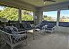 Living room surrounded by windows