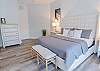 Master bedroom with king size bed and en-suite bathroom