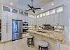 Fully equipped gourmet kitchen with wine cooler ??