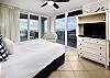 Master Bedroom with King Size Bed and Floor to Ceiling Windows/Slider to Balcony