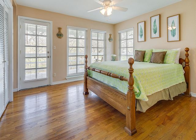 Queen size bed in upstairs guest bedroom. Private access to wrap around porch!