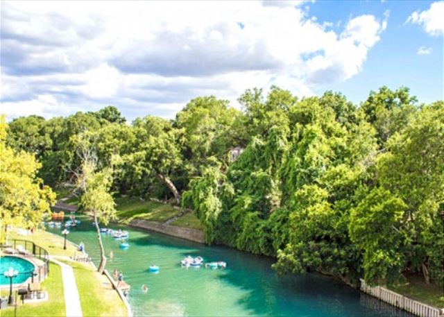 The Comal River flows in the back of the condos.