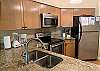  Fully stocked kitchen with stainless appliances, granite counter tops. 