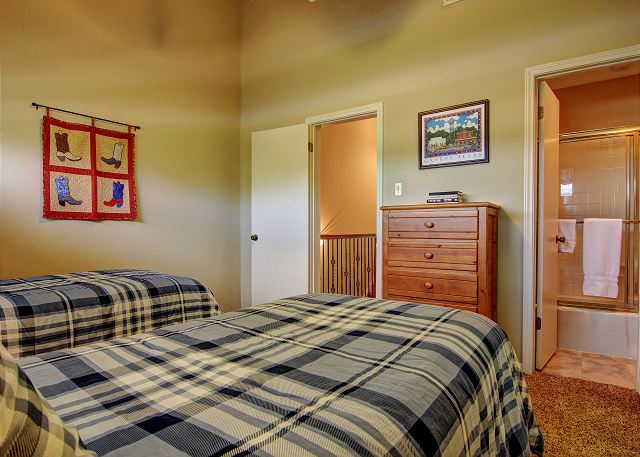 Second bedroom with 2 twin beds and a private bathroom. 
