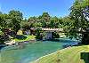With Schlitterbahn right across the street and the Comal River right out your back door with direct river access, this is the perfect vacation spot. 