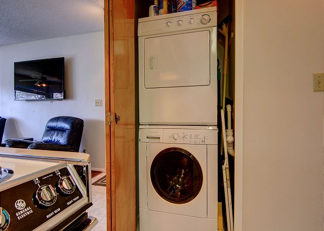Washer and dryer in the unit for added convenience.