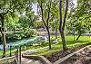 This complex has stunning Comal River access! 