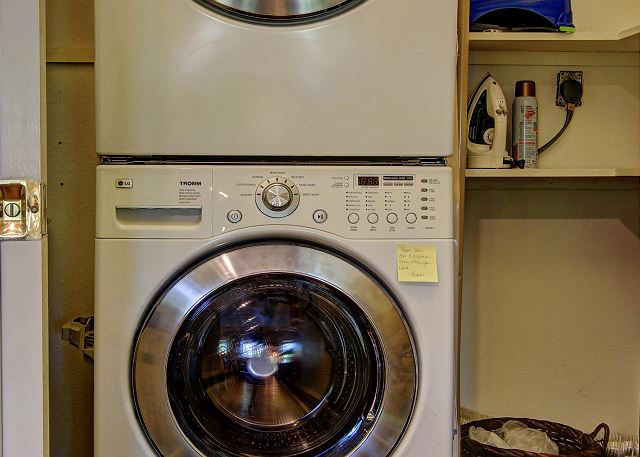 Full size washer and dryer upstairs next to the kitchen.