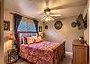 2nd bedroom with a Queen sized bed in D302