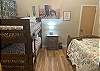 2nd bedroom with a twin over twin bunkbed and a full size bed.