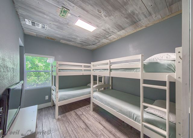 Second guest bedroom has two sets of twin bunk beds. Both memory foam mattresses!