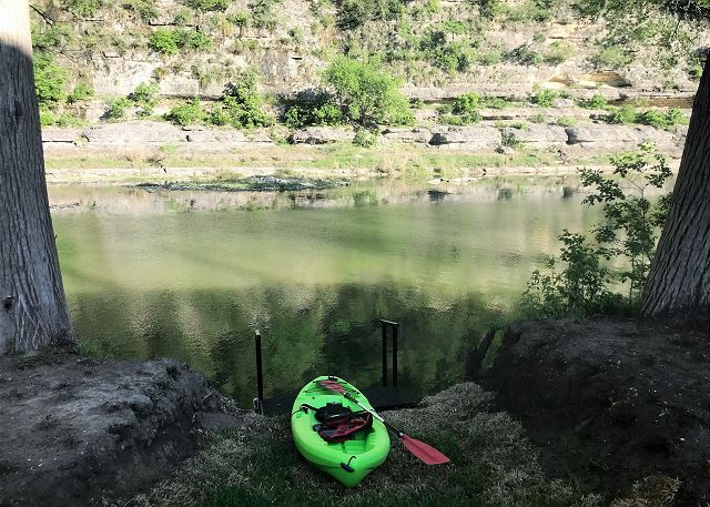  8 ft. kayak, one 10.5 ft. two person kayak, as well as 2 hammocks (perfect for a midday nap)! There are steps which lead out to the river which is about waist deep.