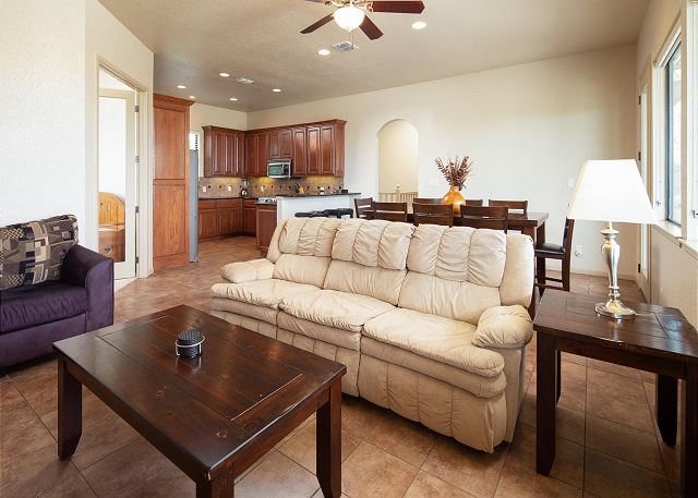 Spacious living room with cable TV and a sofa sleeper, dining area and kitchen. The views are spectacular!