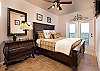 Master bedroom with a king size bed! 