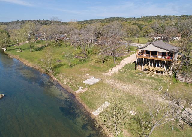 Lots of space in the back yard! and a walkway leading directly into the Guadalupe River!