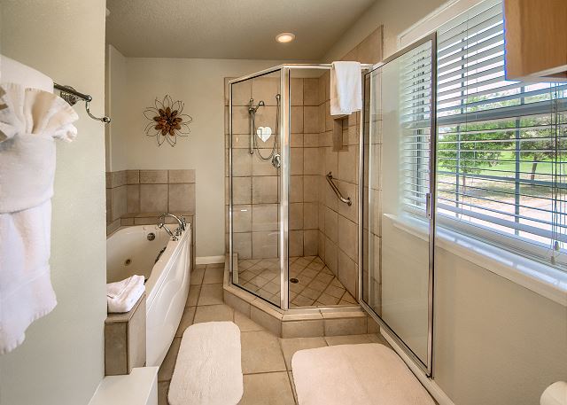 Master suite has a stand up shower and an AWESOME soaking tub! 