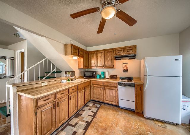 Cottage kitchen stocked with appliances to show off your culinary talents! 