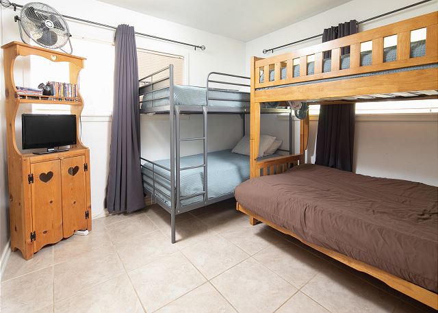 2nd guestroom has a twin over twin bunk bed and a twin over full bunk bed. 