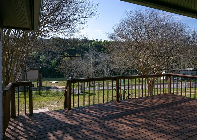 Large deck on the front of the house affords great views of the Guadalupe River.
