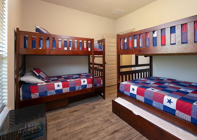  The first guest room has a full over full bunk bed as well as a twin over twin bunk.