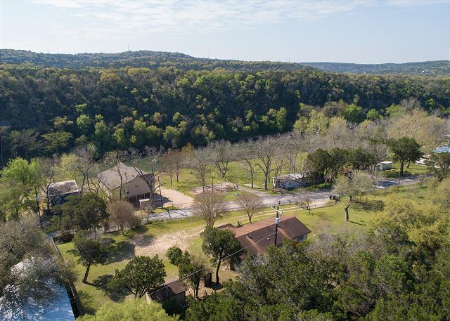 This listing is for two separate homes on beautiful River Road. One closest to the water is "Southern Comfort" and the other is "The Lazy A" right across the street! 
Together they make "Lazy Southern Getaway"