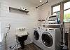 AMAZING laundry room with so much space!