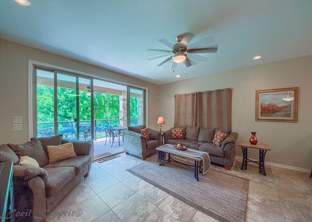 Living rooms have amazing views of the river and open out to fabulous covered patios with comfortable seating.