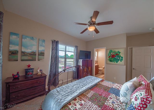 Master bedroom has a king size bed, Flat screen TV as well as a private bathroom.