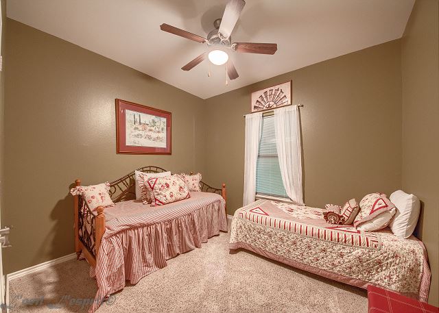 Guest bedroom with 2 twin beds. 