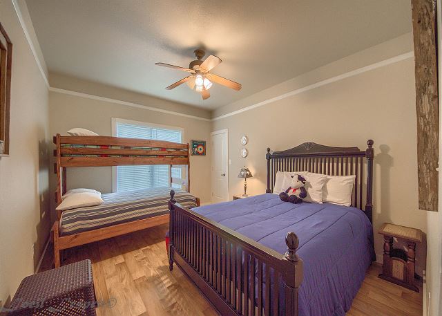 Guest bedroom has a Queen size bed and a twin over full bunk bed. 