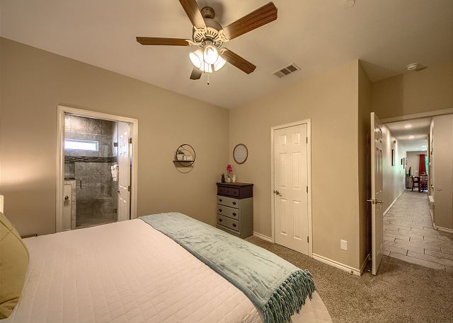 Master bedroom with a King size bed!