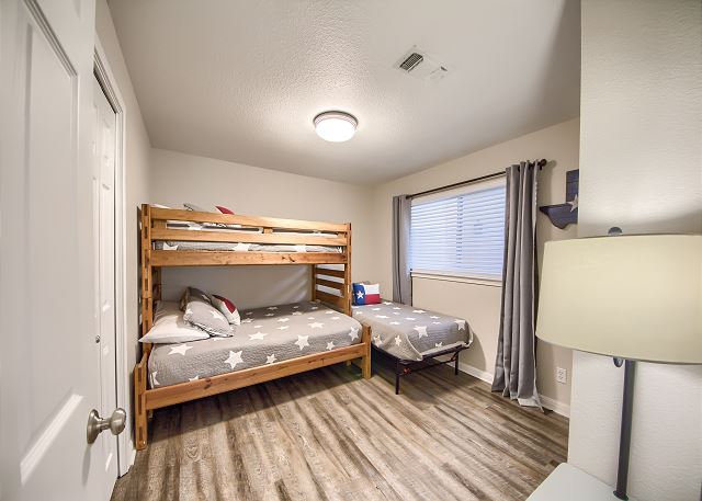 Guest bedroom with a Twin over Full bunk bed, and a Twin bed!