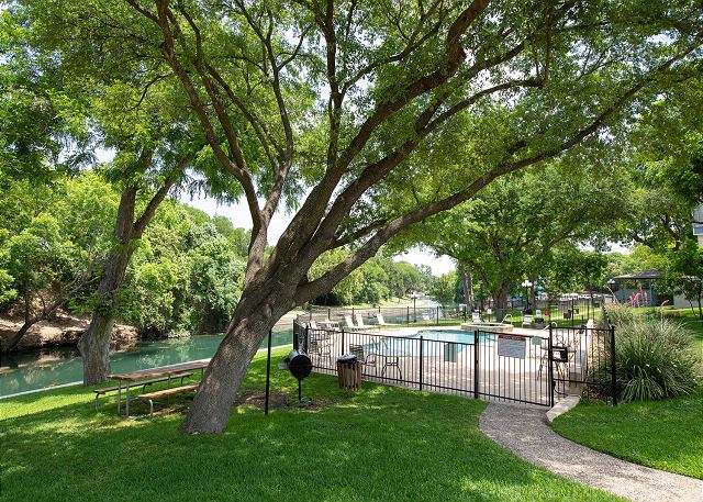 Gated pool with lovely shade trees!