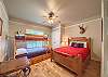 Texas Star 3rd bedroom with a Queen size bed and a twin over full bunk bed.