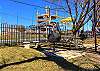 Community Charcoal Grills and Picnic Tables right across the Street from Schlitterbahn. 