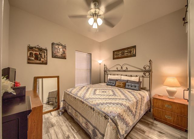 Master bedroom with a King size bed.