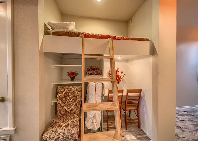 Twin size upper bunk in the hallway.