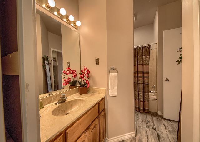 Bathroom with a tub/shower.