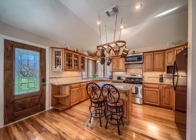 Spacious, fully stocked kitchen with full size appliances.