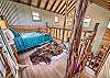 Cabin loft has a queen size bed