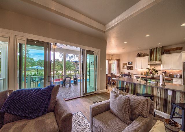 Living Room with beautiful glass doors leading to the porch! 