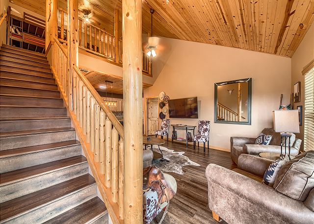 Living room and stairs to the upstairs loft! 