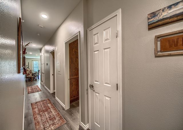 Hallway with guest bedrooms and guest bathroom.