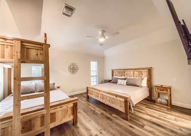 Master Bedroom with King Size bed and Twin over Queen Bunk. 