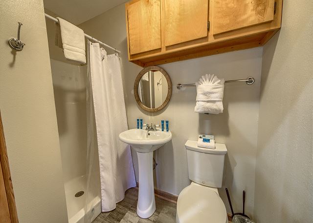 No Hurry: Full bathroom with standing shower. 