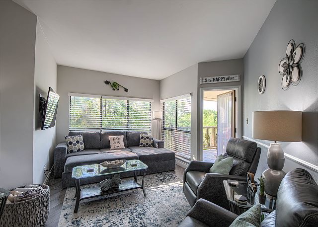 Settle in to this cozy living room with all new furniture. 