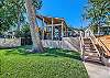 View of home from the back. You can't go wrong with this deck!