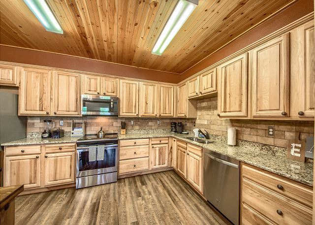 Kitchens have granite counter tops and stainless steal appliances